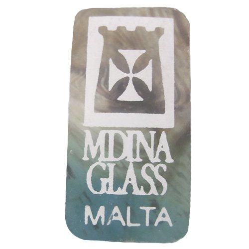 Mdina glass clear plastic label